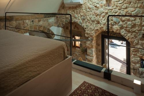 Postel nebo postele na pokoji v ubytování "LA TORRE" di POZZO VOLITO
