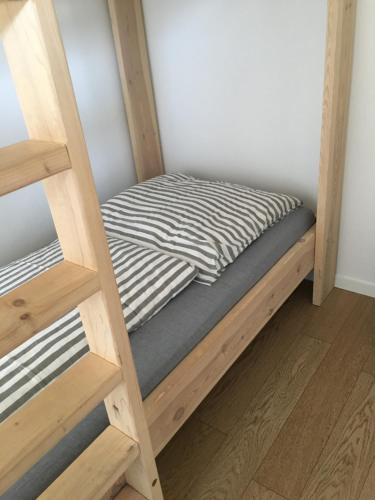 Ein Bett oder Betten in einem Zimmer der Unterkunft Ferienhaus Fehmarn - Schwedenhaus 1