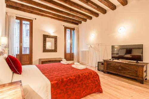 En eller flere senge i et værelse på Palazzo DaPonte