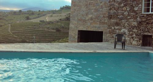 Bazén v ubytování Quinta da Ribeira nebo v jeho okolí