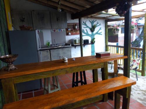 Kuchyň nebo kuchyňský kout v ubytování Hostal Macondo Inn