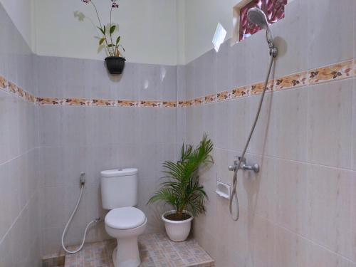 Koupelna v ubytování Gusti Rai House