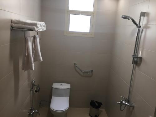 Ένα μπάνιο στο Arif Serviced Apartments