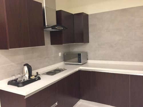 Dapur atau dapur kecil di Arif Housing Units