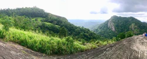a group of people standing on top of a mountain at Ceylon Saradiel Home Stay in Mawanella