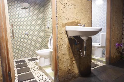 Kúpeľňa v ubytovaní Damuh Guest House