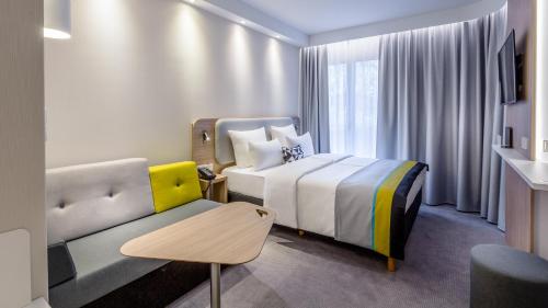 Tempat tidur dalam kamar di Holiday Inn Express - Wuppertal - Hauptbahnhof, an IHG Hotel
