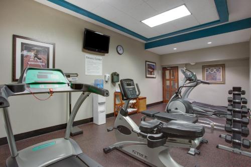 a gym with two exercise bikes and a treadmill at Holiday Inn Express Washington DC East- Andrews AFB by IHG in Camp Springs
