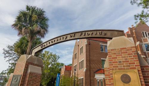 a university of florida sign in front of a brick building at Holiday Inn Express & Suites Ocala by IHG in Ocala