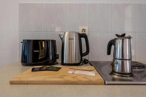 Olympia Mareにあるコーヒーまたはお茶