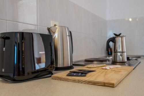 Olympia Mareにあるコーヒーまたはお茶