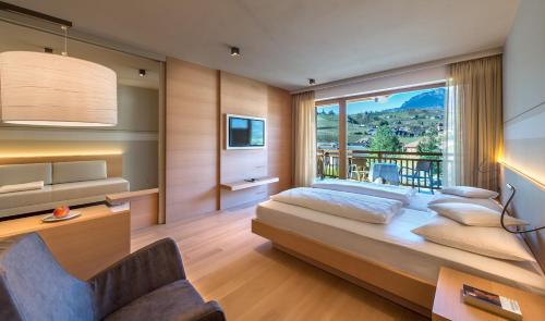 Postel nebo postele na pokoji v ubytování Hotel Spitaler