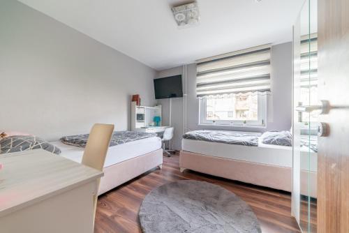 Postel nebo postele na pokoji v ubytování Private Apartment