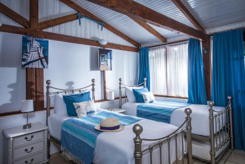Ένα ή περισσότερα κρεβάτια σε δωμάτιο στο Serenity Estate