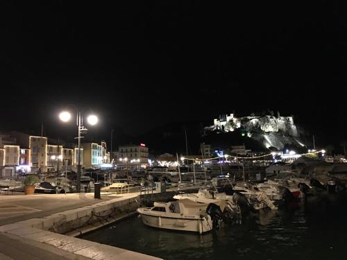 a group of boats docked in a marina at night at appartement du pêcheur à Cassis à 10 mètres du port in Cassis