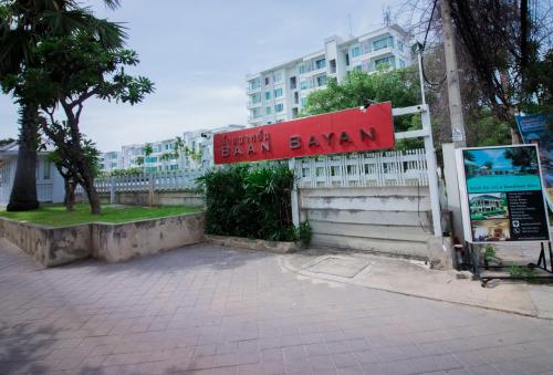 a building with a sign that reads brazil bryan at Baan Bayan - Hua Hin - SHA Extra Plus in Hua Hin