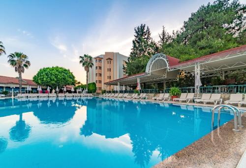 The swimming pool at or close to Armas Kaplan Paradise