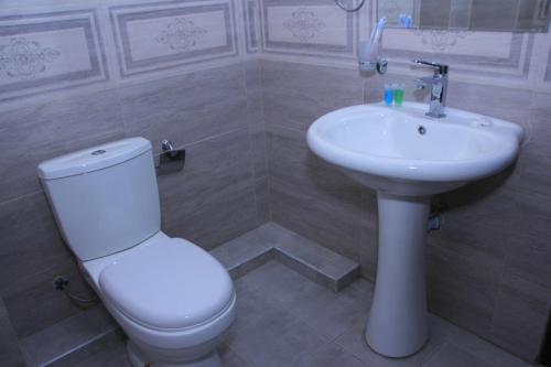 Salle de bains dans l'établissement Flamenco Hotel