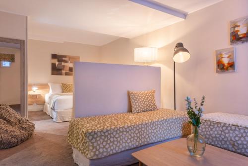 Ένα ή περισσότερα κρεβάτια σε δωμάτιο στο Hotel 29 Lepic