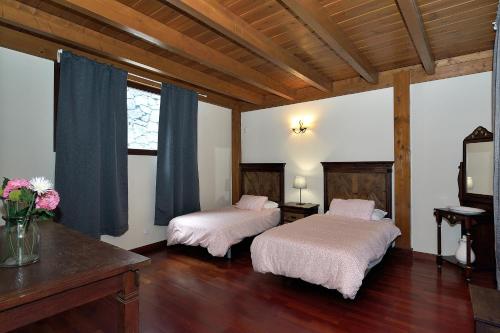 Villa Nelida peace lovers Vegueta By PVL tesisinde bir odada yatak veya yataklar