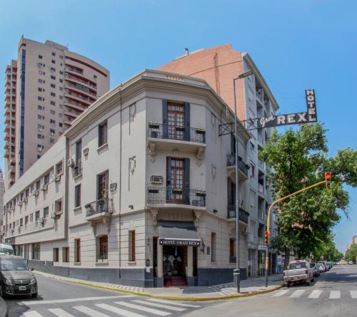 
a city street with a tall building at Gran Rex Hotel in Córdoba

