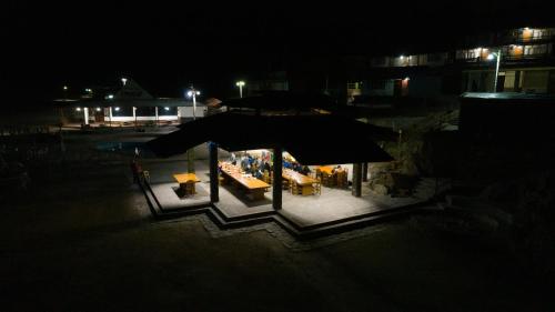 a night view of a playground with a tent at Hotel Puerto Inka in Chala