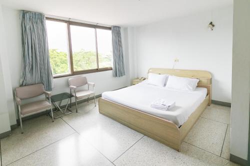 Postel nebo postele na pokoji v ubytování Tokyo Hotel