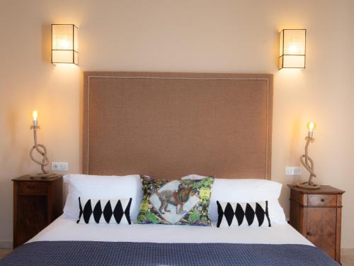 Katil atau katil-katil dalam bilik di Hôtel La Dimora & Spa