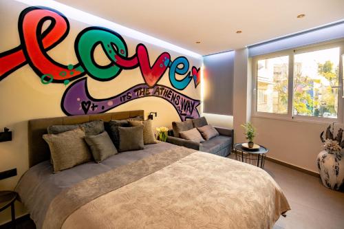 a bedroom with a bed with a painting on the wall at Triple A - Graffiti Homage in Psirri Square - FREE Parking! in Athens