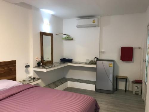 Postel nebo postele na pokoji v ubytování Green guesthouse kohchang