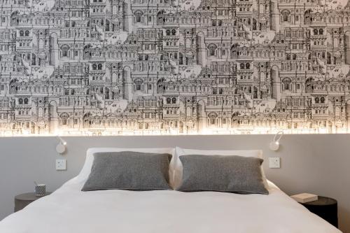 Letto o letti in una camera di MiHotel Bizolon