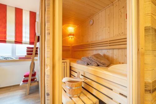 a sauna with a bed in a wooden cabin at Große Wies in Oberstdorf