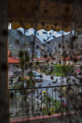 a view of a city from a window of a building at Avgi in Kato Loutraki