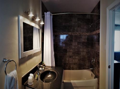 Ванная комната в Travellers Motel