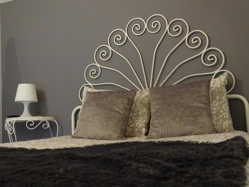 Ένα ή περισσότερα κρεβάτια σε δωμάτιο στο Apartment My Home
