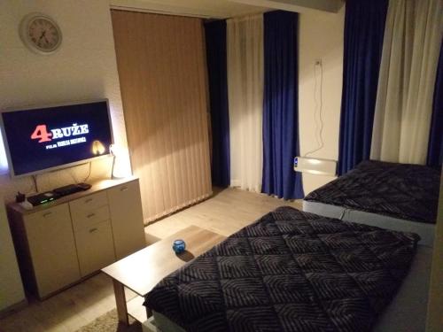 Postel nebo postele na pokoji v ubytování Skadarska Blue