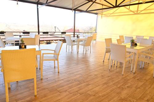 Restaurant ou autre lieu de restauration dans l'établissement Harmony Hotel
