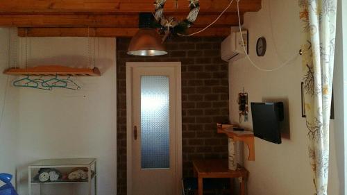 Telewizja i/lub zestaw kina domowego w obiekcie B&B PompeiLog