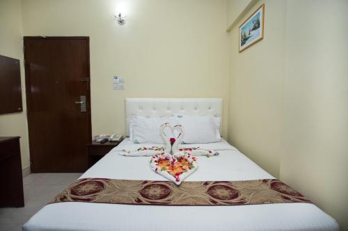 Postel nebo postele na pokoji v ubytování Hotel Vista Bay
