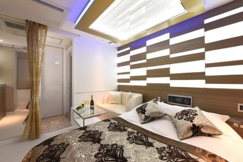 Postel nebo postele na pokoji v ubytování HOTEL W-PARTY-W GROUP HOTELS and RESORTS-