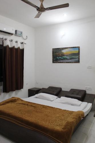 Postel nebo postele na pokoji v ubytování Sunset Backpackers Hostel