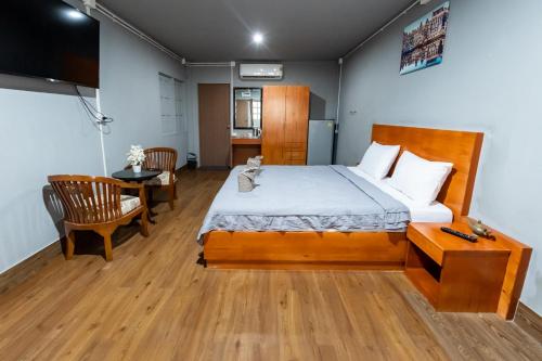 Postel nebo postele na pokoji v ubytování Aladdin Guest House
