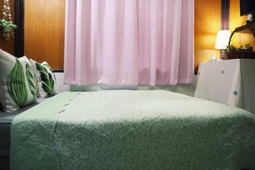 Ένα ή περισσότερα κρεβάτια σε δωμάτιο στο Small Guest House Koh Kood