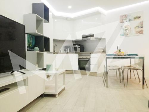 Η κουζίνα ή μικρή κουζίνα στο Paradise Ocean Suite