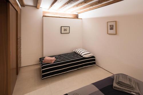 Posteľ alebo postele v izbe v ubytovaní The Carpenter's House - Smart Venice Collection