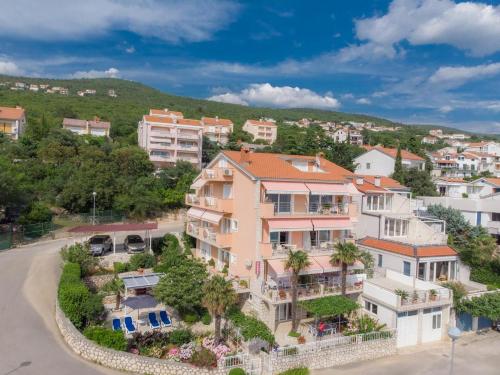 an aerial view of a building in a city at MAURIZIUS 6,7 in Dramalj