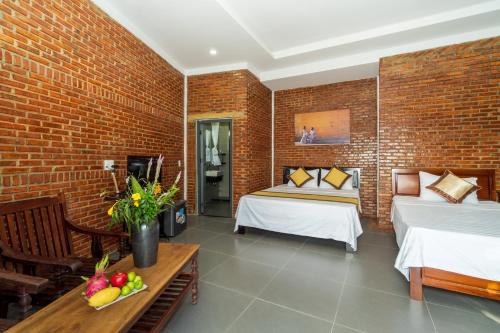 Katil atau katil-katil dalam bilik di Autumn Bay Riverside Villa