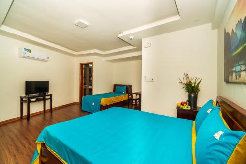 Televisyen dan/atau pusat hiburan di Autumn Bay Riverside Villa