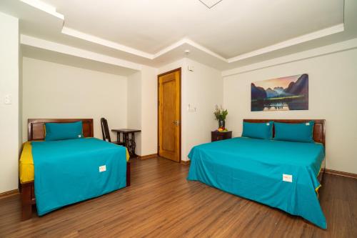 Katil atau katil-katil dalam bilik di Autumn Bay Riverside Villa
