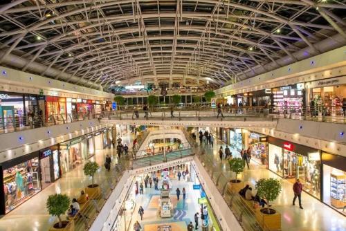 an overhead view of a shopping mall at Central Orient Residence - Modern, spacious and sunny! By the river! in Lisbon